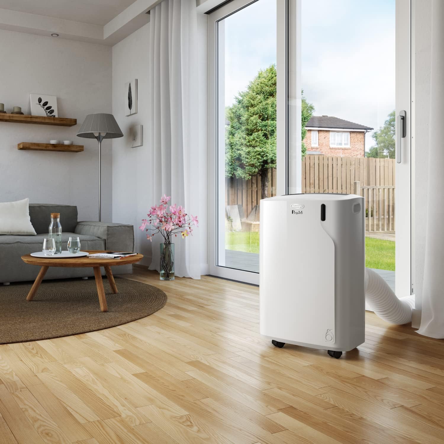 De’Longhi Pinguino PAC EM82 Eco Mobile Air Conditioner with Exhaust Hose, Dehumidification and Ventilation Function, Air Conditioning for Rooms up to 80 m³, Integrated Dust Filter and 24-hour Timer, White